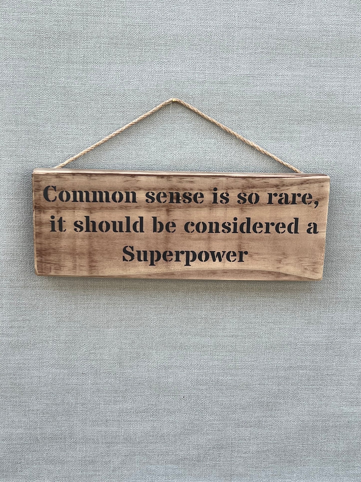 Handmade wooden sign - Common sense is so rare, it should be considered a Superpower