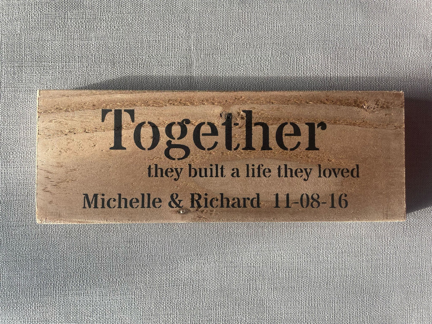 Handmade persoalised wedding or anniversary gift wooden sign (Together they built a life they loved)