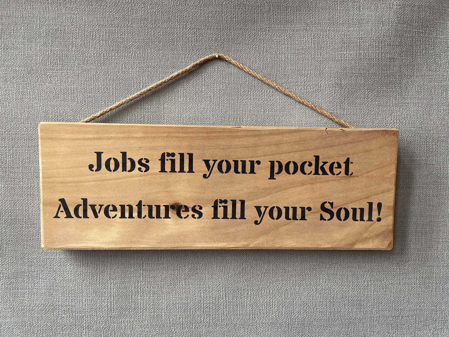 Handmade wooden sign (Jobs fill your pockets, adventures fill you soul)