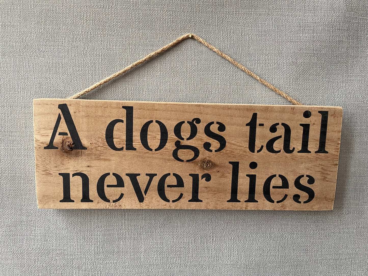 Handmade wooden sign - (A dogs tail never lies)