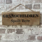 Handmade wooden sign (GRANDCHILDREN Spoilt here)