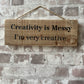 Handmade wooden sign - (Creativity is Messy I'm very creative)