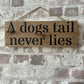 Handmade wooden sign - (A dogs tail never lies)