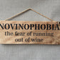 Handmade wooden sign - (NOVINOPHOBIA the fear of running out of wine)