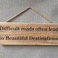 Handmade wooden sign (Difficult roads often lead to beautiful destinations)