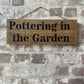 Handmade wooden sign - (Pottering in the Garden)