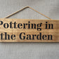 Handmade wooden sign - (Pottering in the Garden)