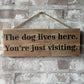 Handmade wooden sign - The dog lives here. You're just visiting.