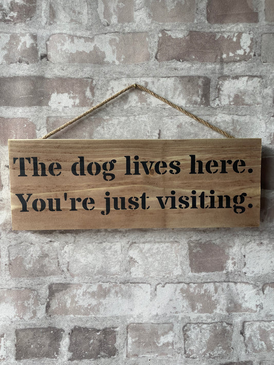 Handmade wooden sign - The dog lives here. You're just visiting.
