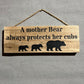 Handmade wooden sign - A mother Bear always protects her cubs