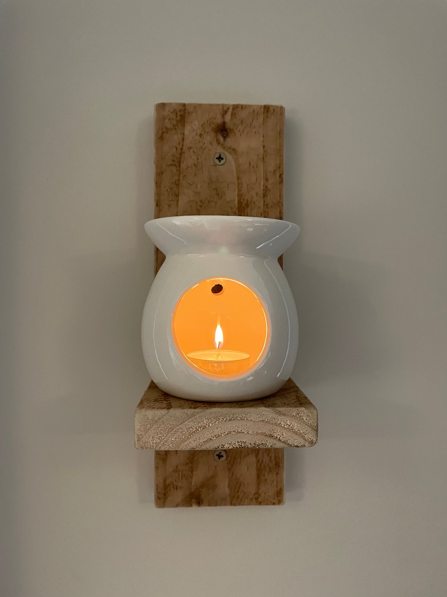 Wooden wall mounted candle holder