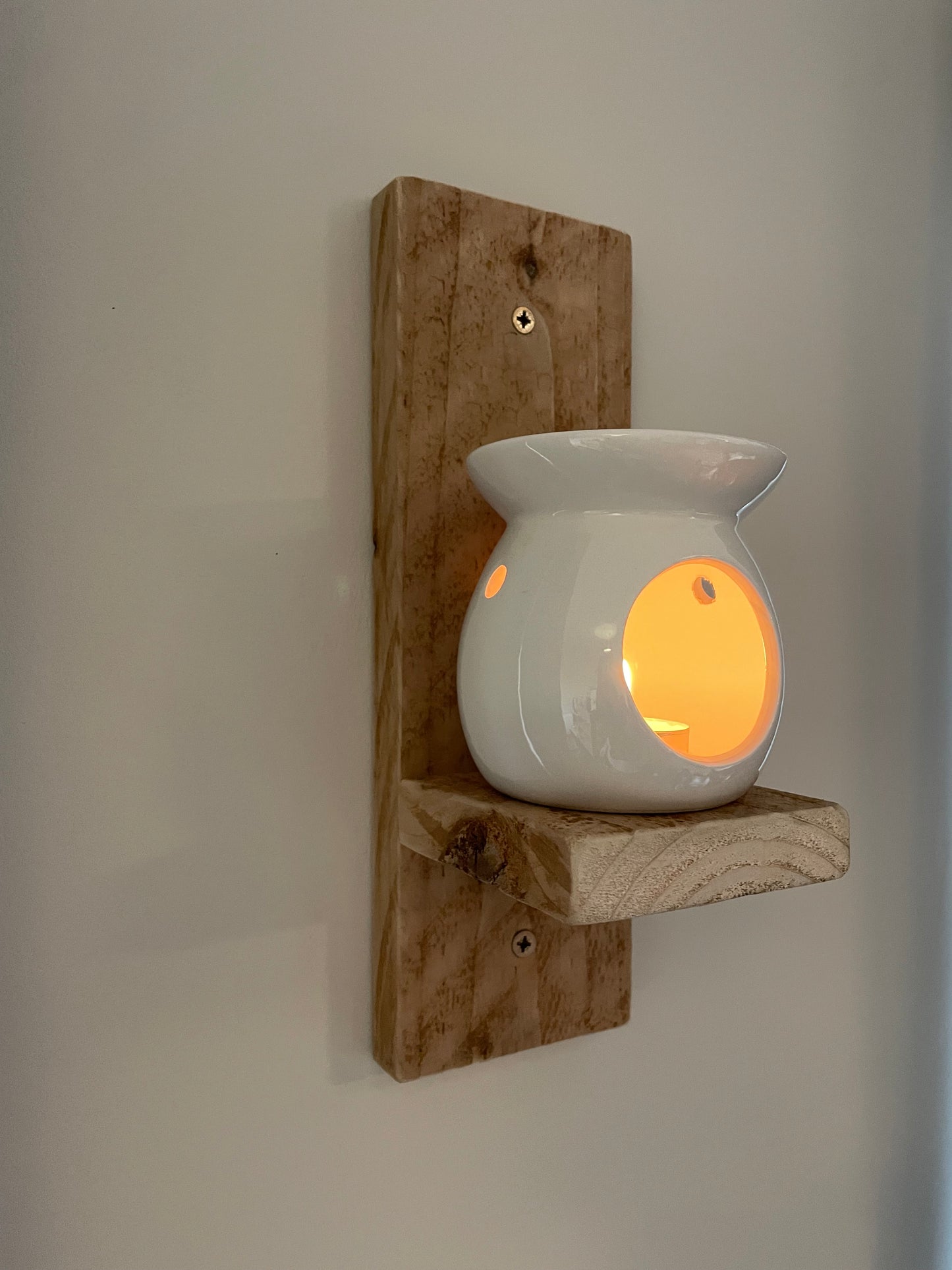 Wooden wall mounted candle holder