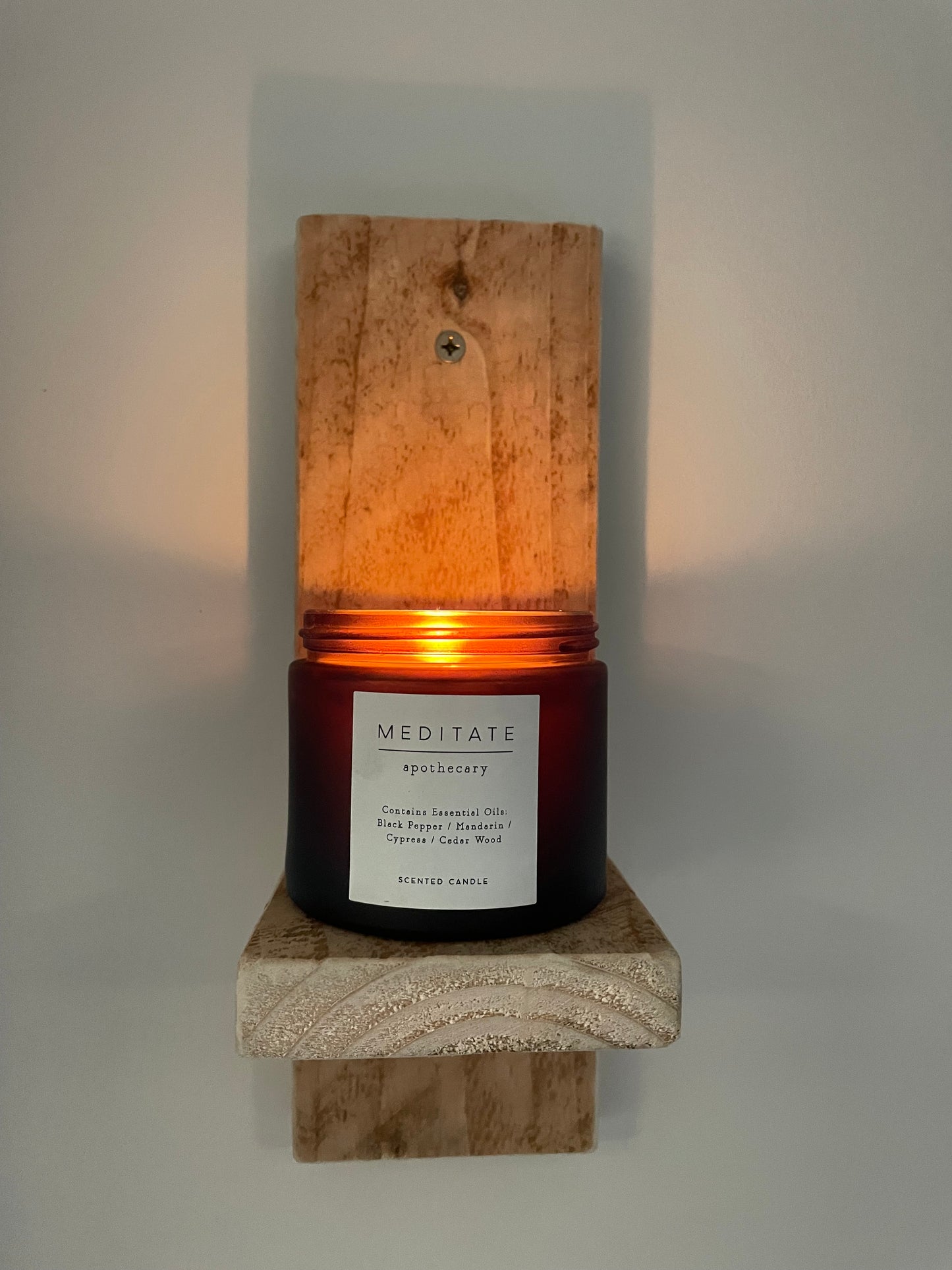 Wooden wall mounted candle holder