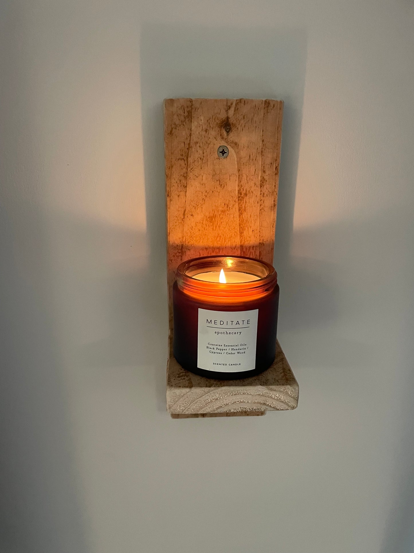 Wooden wall mounted candle holder