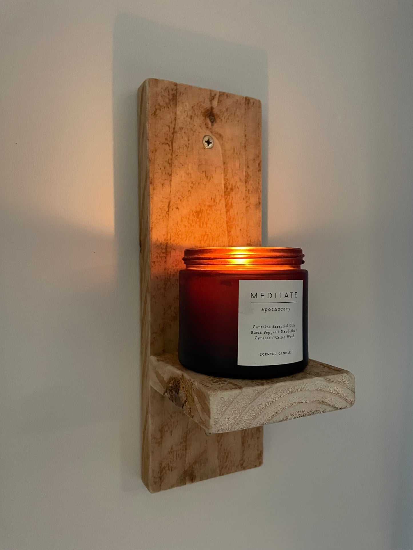 Wooden wall mounted candle holder