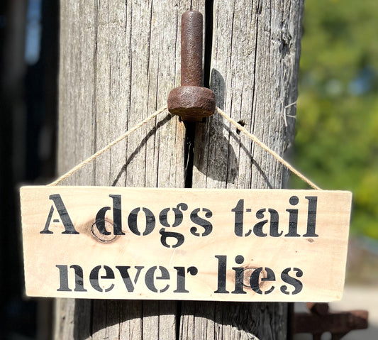 Handmade wooden sign - (A dogs tail never lies)