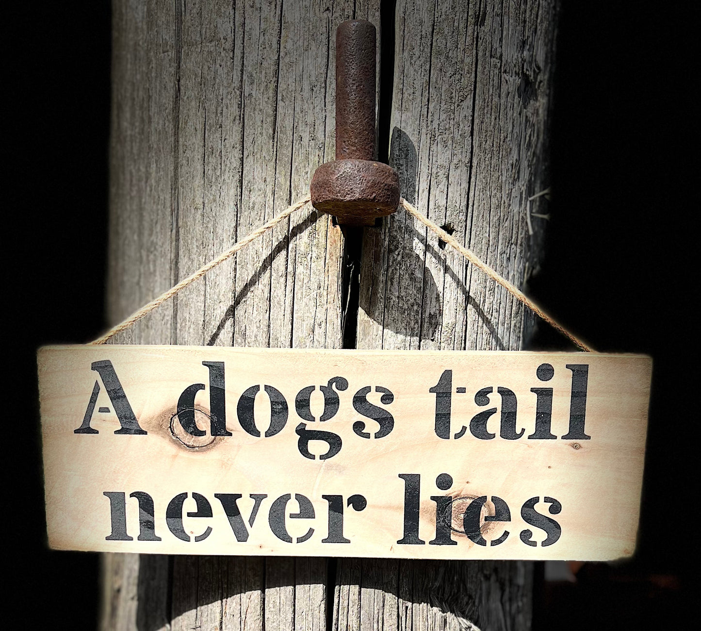 Handmade wooden sign - (A dogs tail never lies)