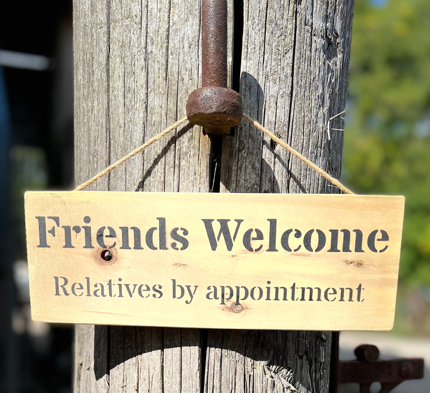 Handmade wooden sign - (Friends Welcome Relatives by appointment)