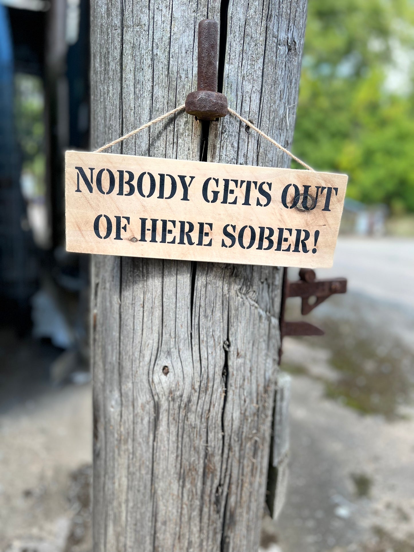 Handmade wooden sign - (NOBODY GETS OUT OF HERE SOBER!)