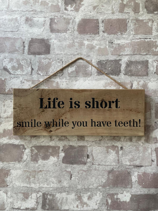 Handmade wooden sign - (Life is short smile while you have teeth!)