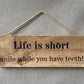 Handmade wooden sign - (Life is short smile while you have teeth!)