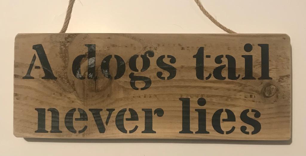 Handmade wooden sign - (A dogs tail never lies)